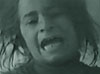 An Afghan girl cries